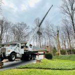 crane setup in driveway for removal